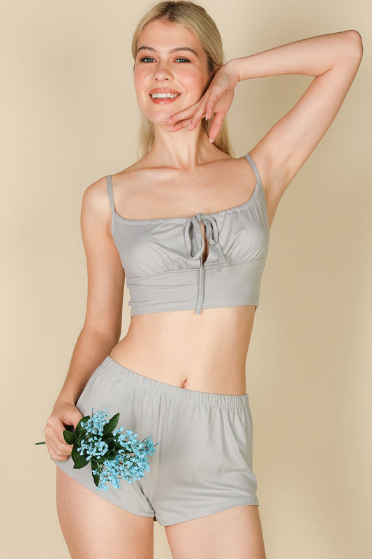 Crop top and shorts set with a tied camisole-style design.