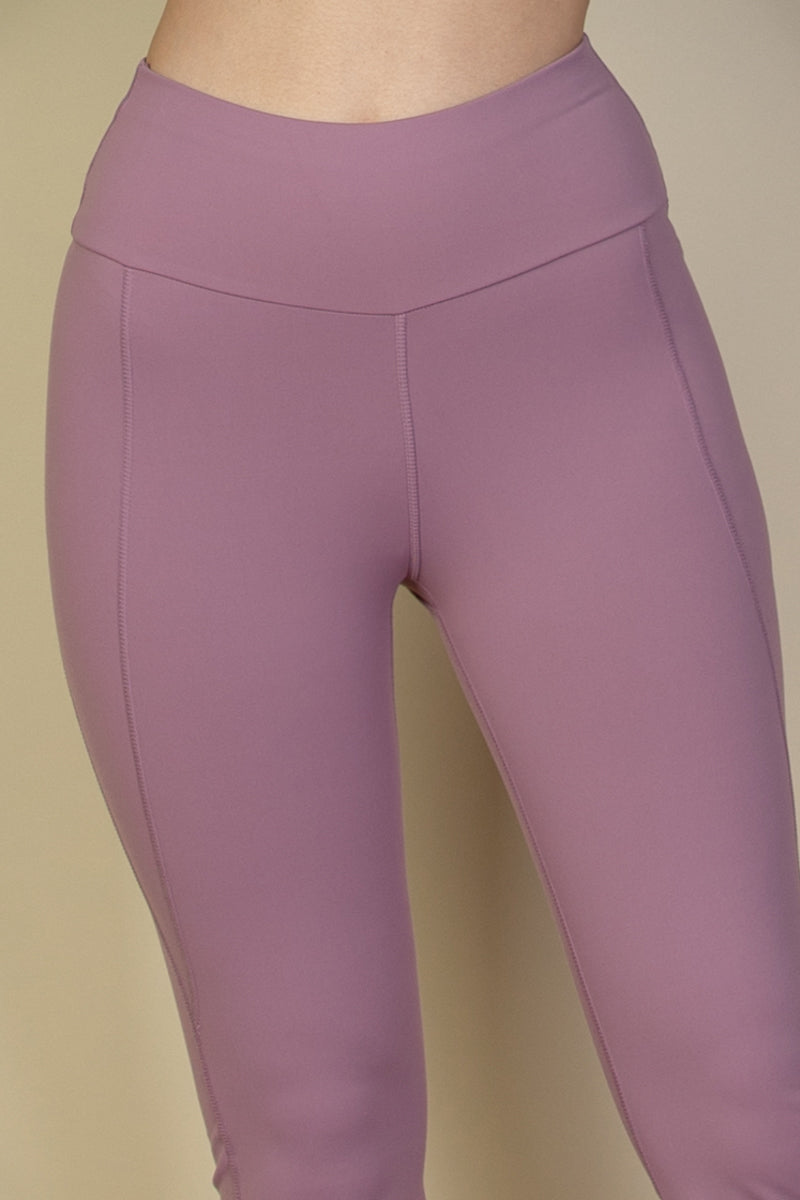 Flare leg pants with a wide waistband.
