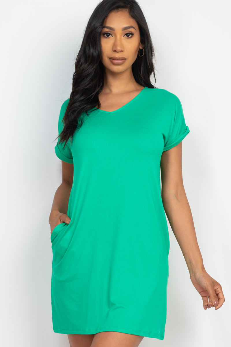 Mini dress with cap sleeves and pockets.