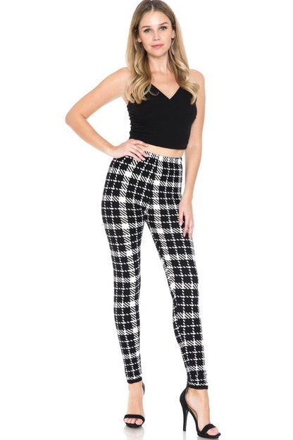 Multi Printed, High Waisted, Leggings With An Elasticized Waist Band.