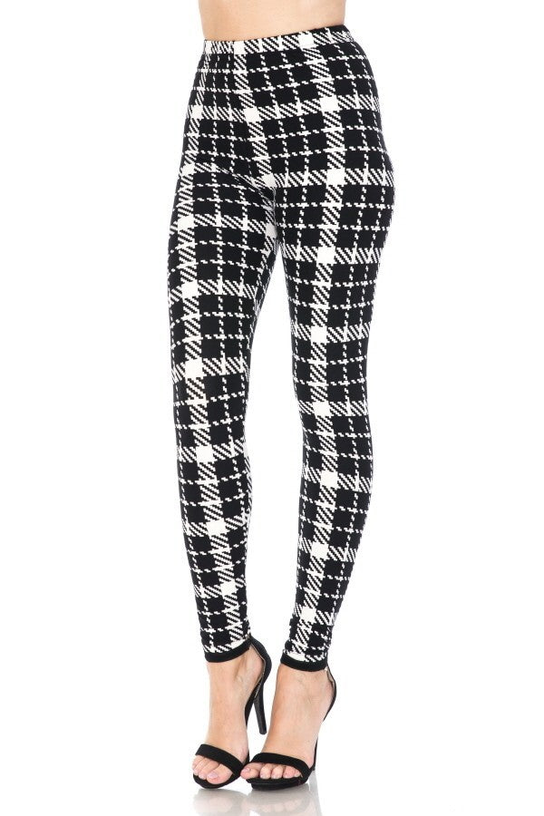 Multi Printed, High Waisted, Leggings With An Elasticized Waist Band.